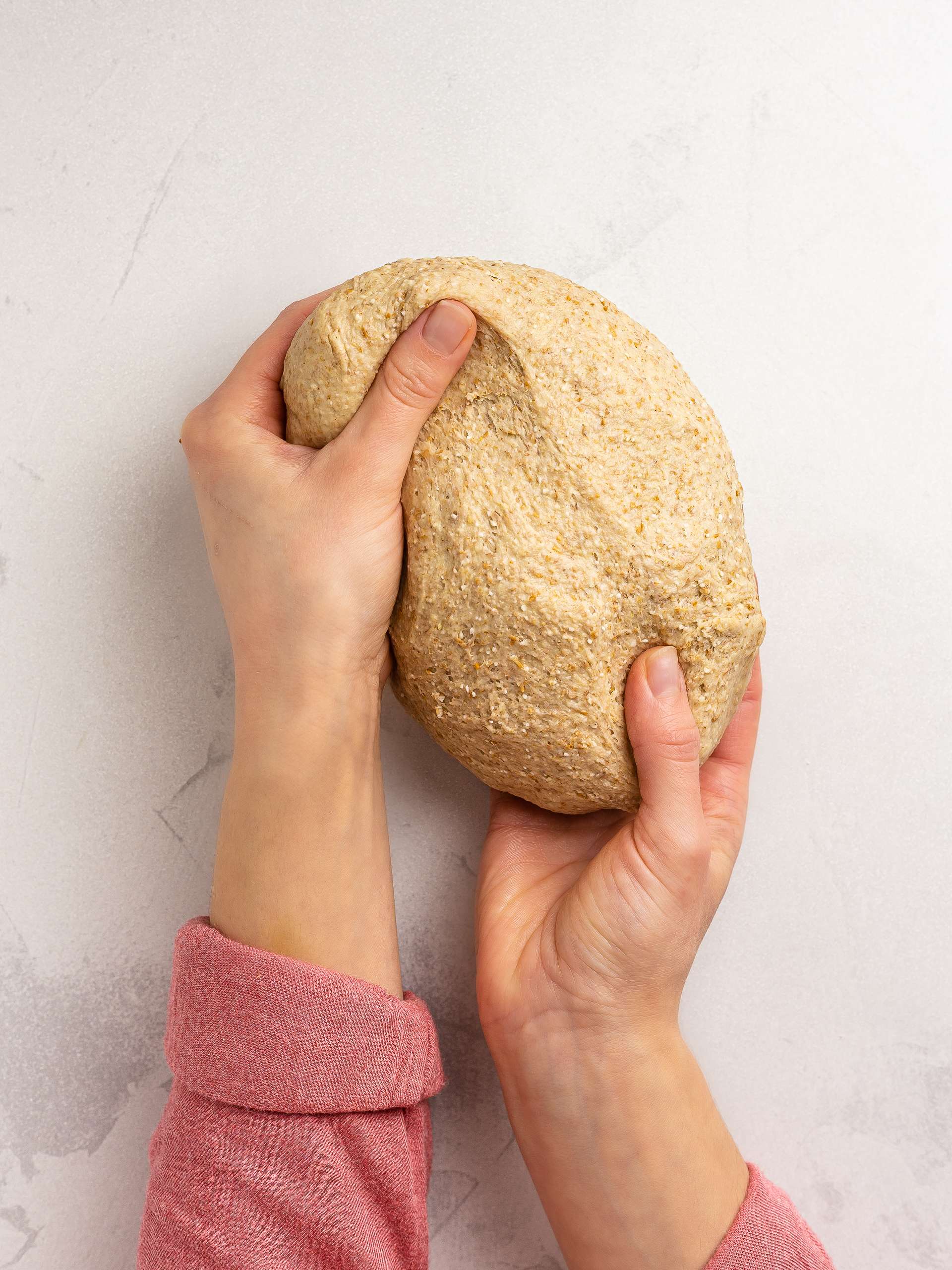 kneading barley rusks dough by hand