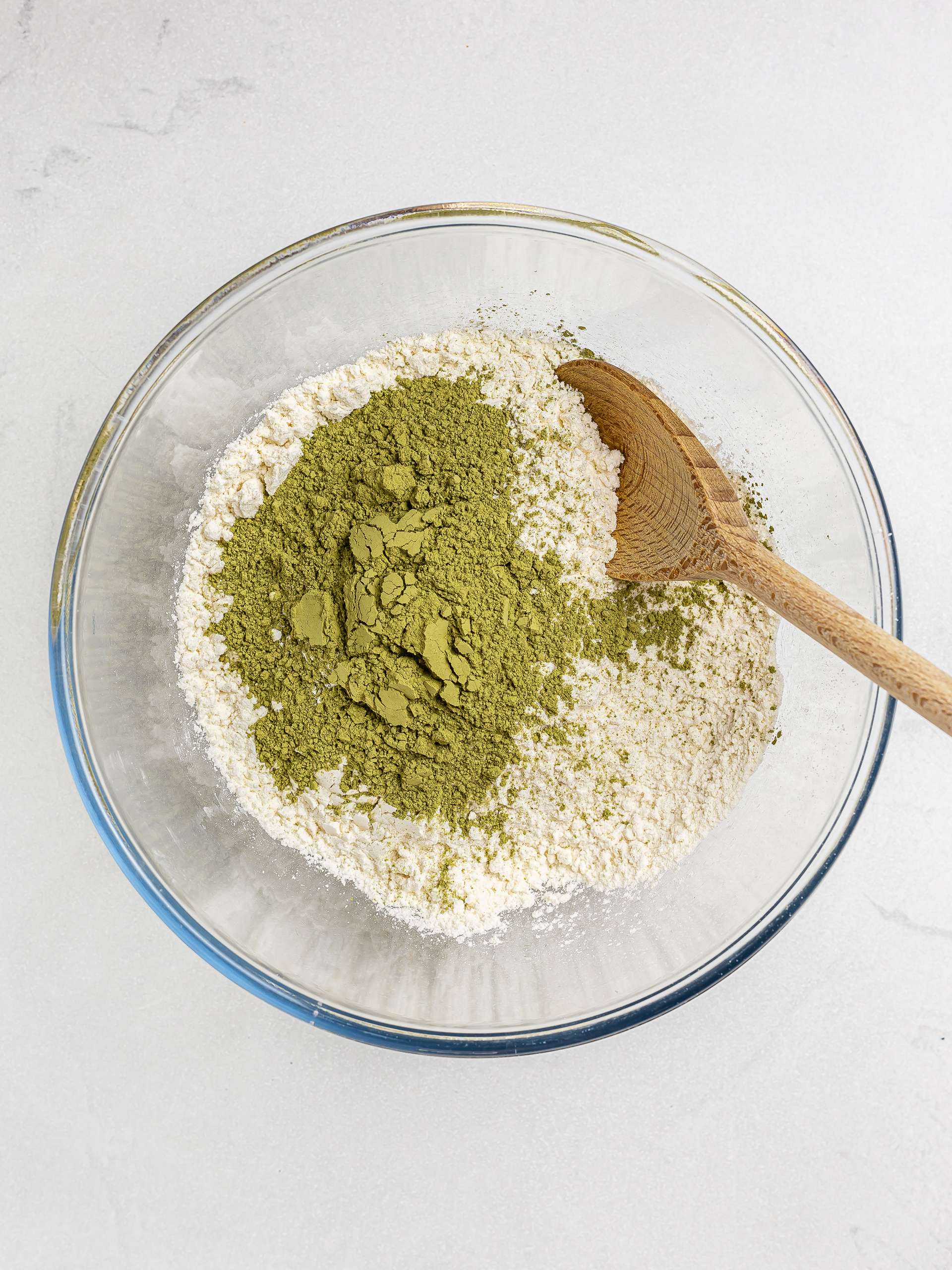 gluten-free flour with matcha powder in a bowl