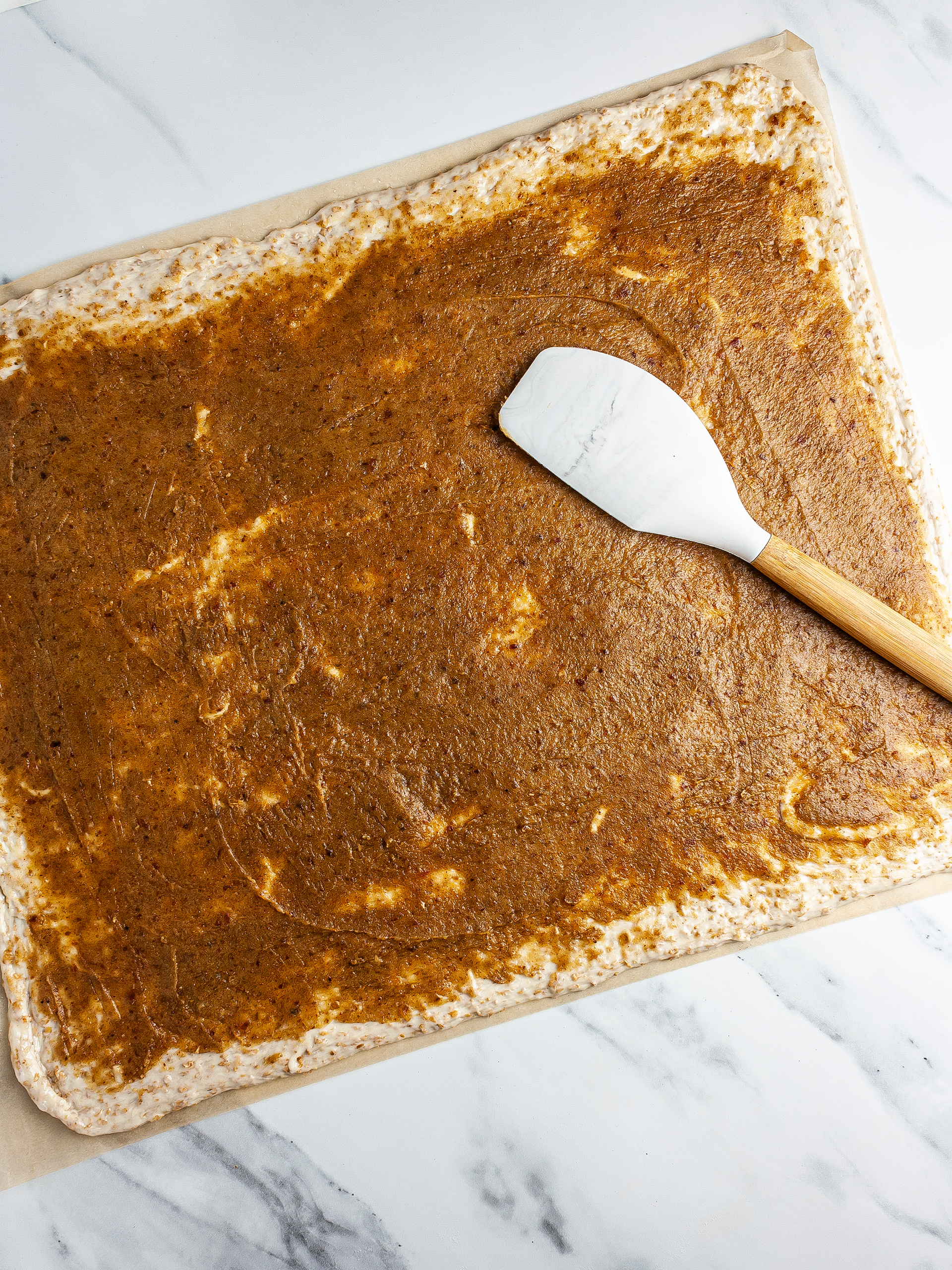 Filling spread over the dough