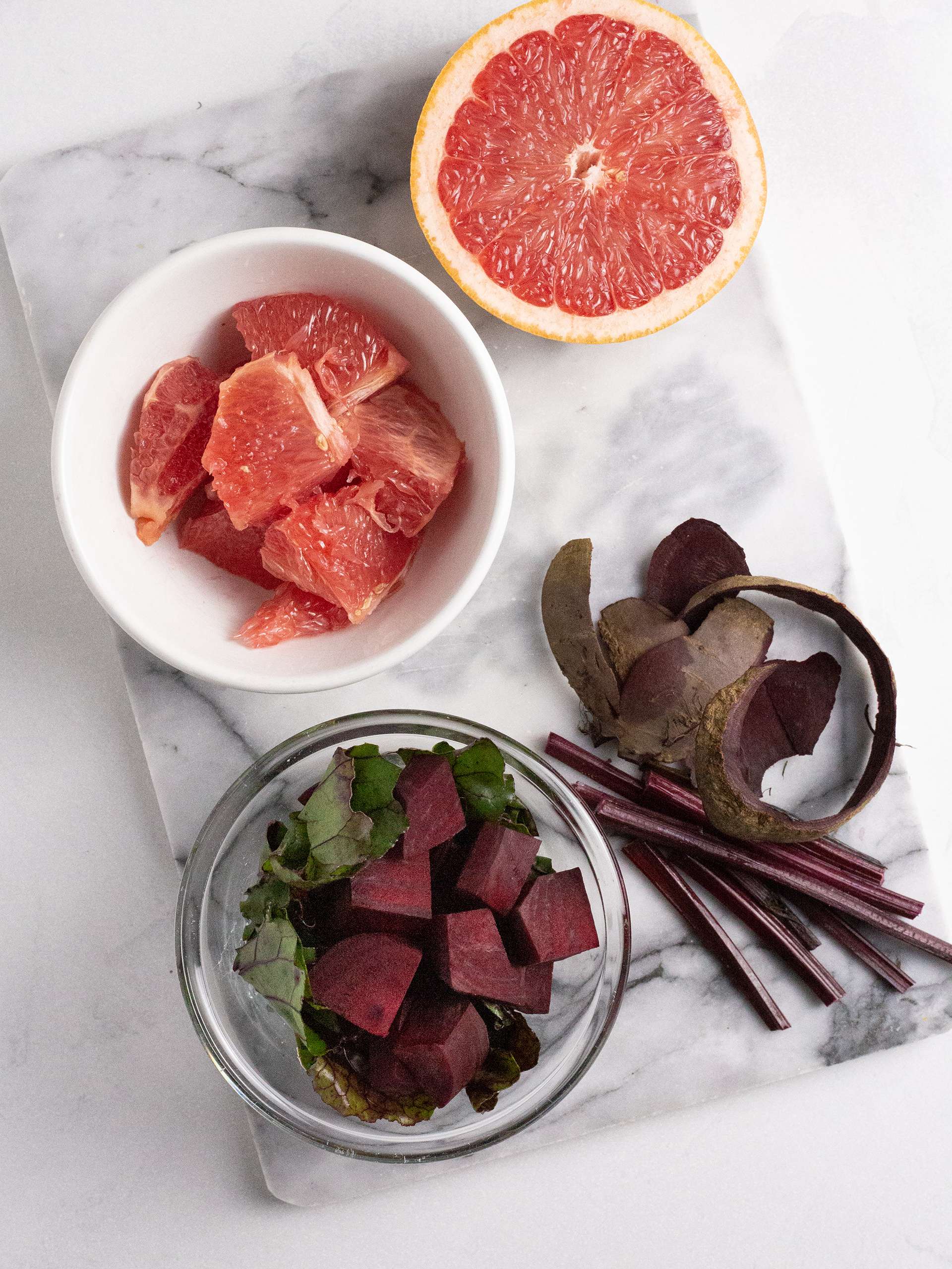 Peeled and sliced beets and grapefruit