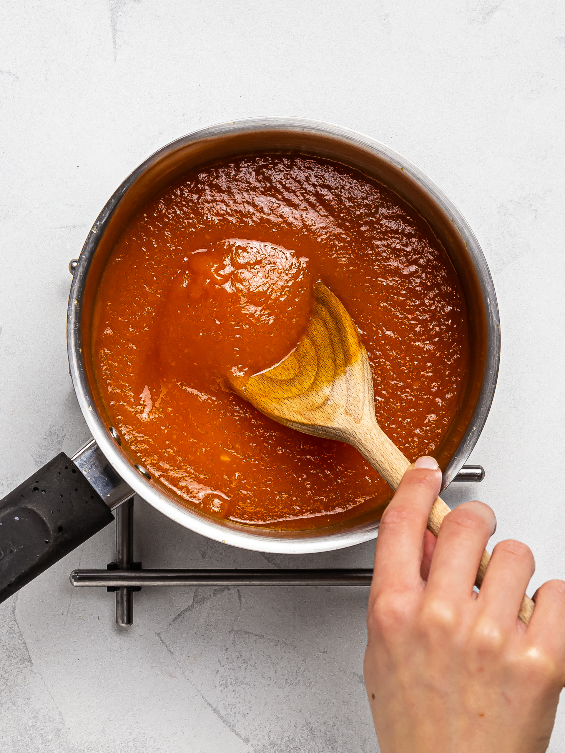 blended papaya jam cooking a pot