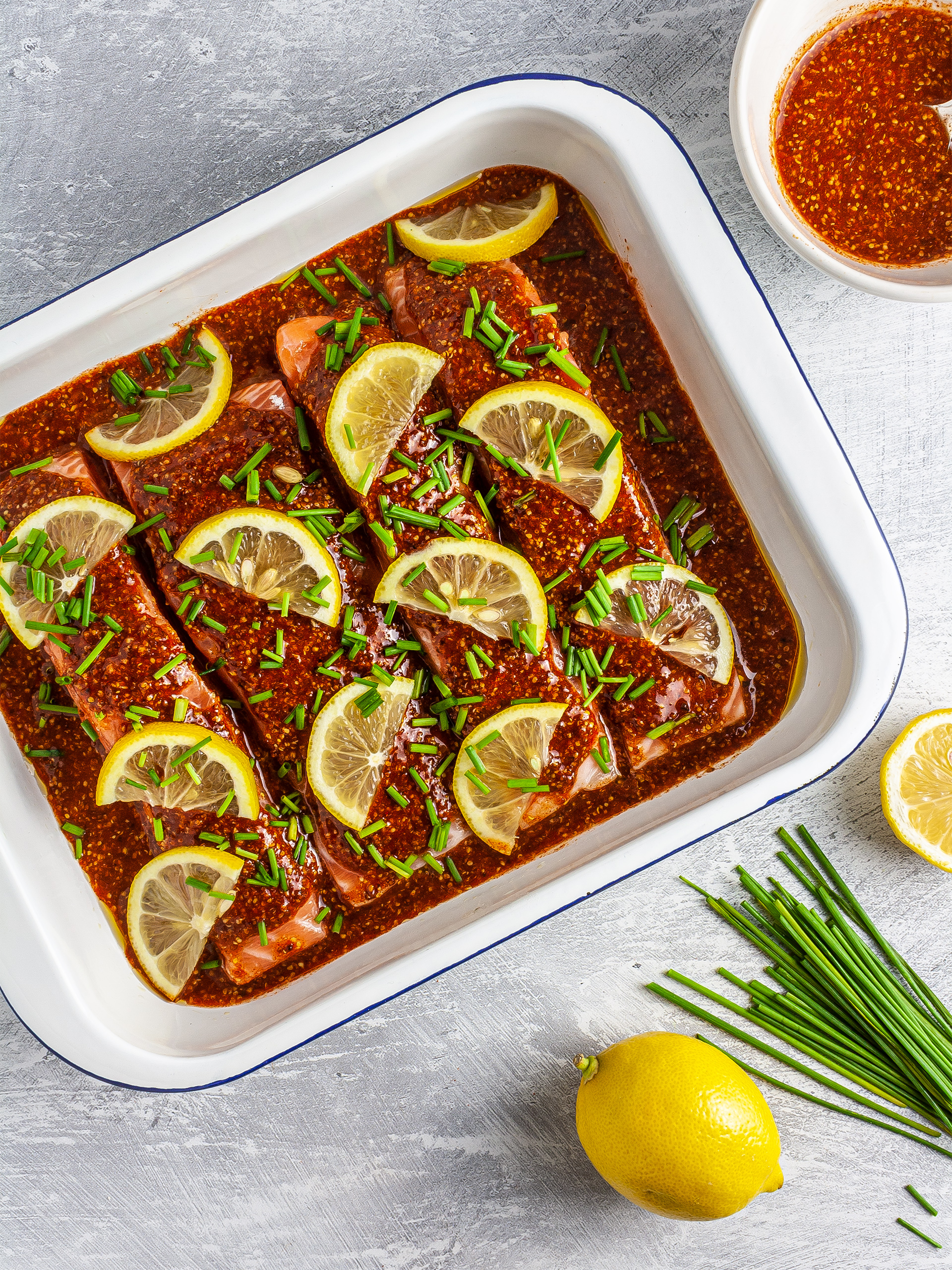 Salmon fillets with honey mustard glaze, lemon, and chives