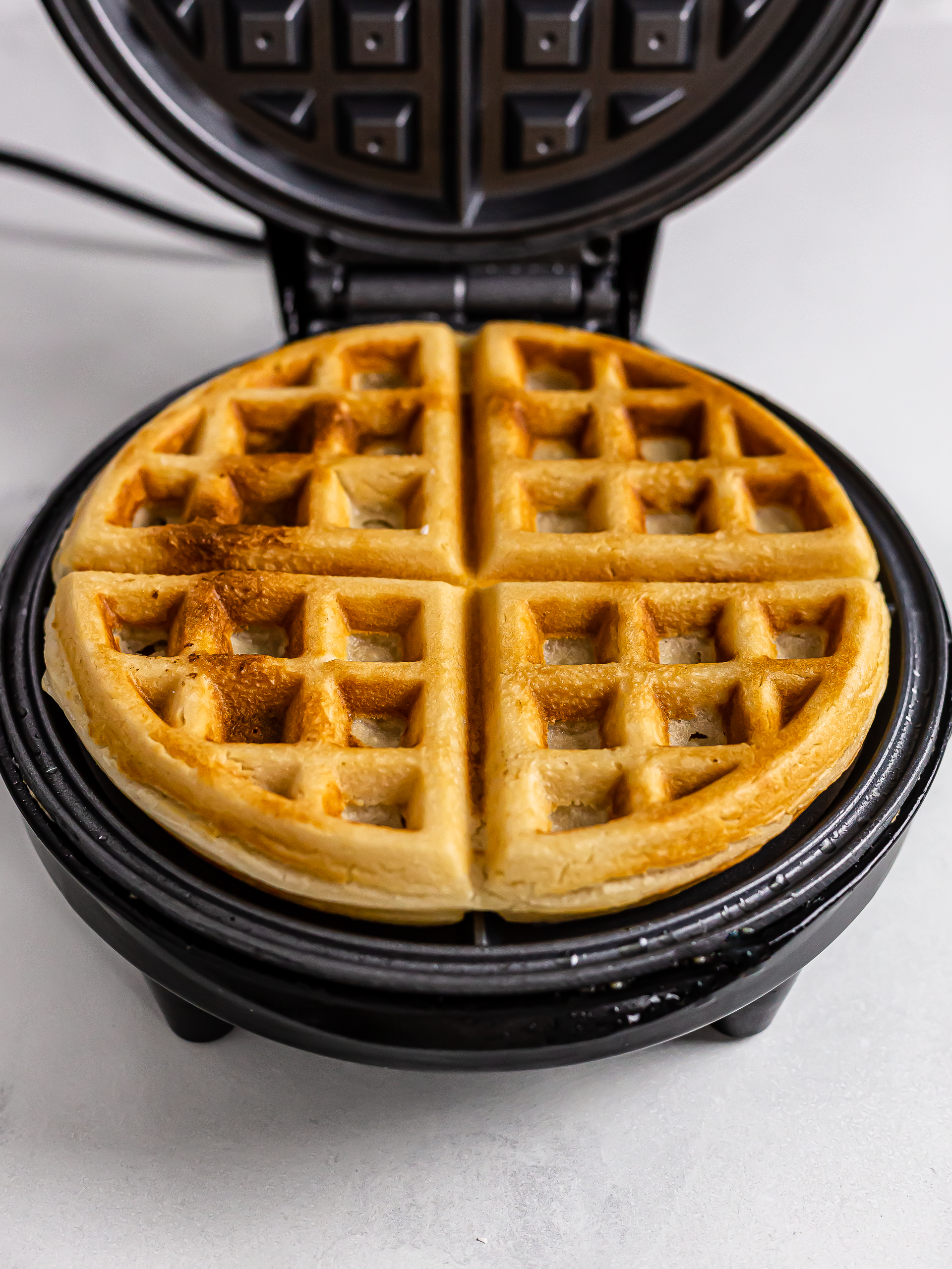 cooked mochi waffle in a waffle machine