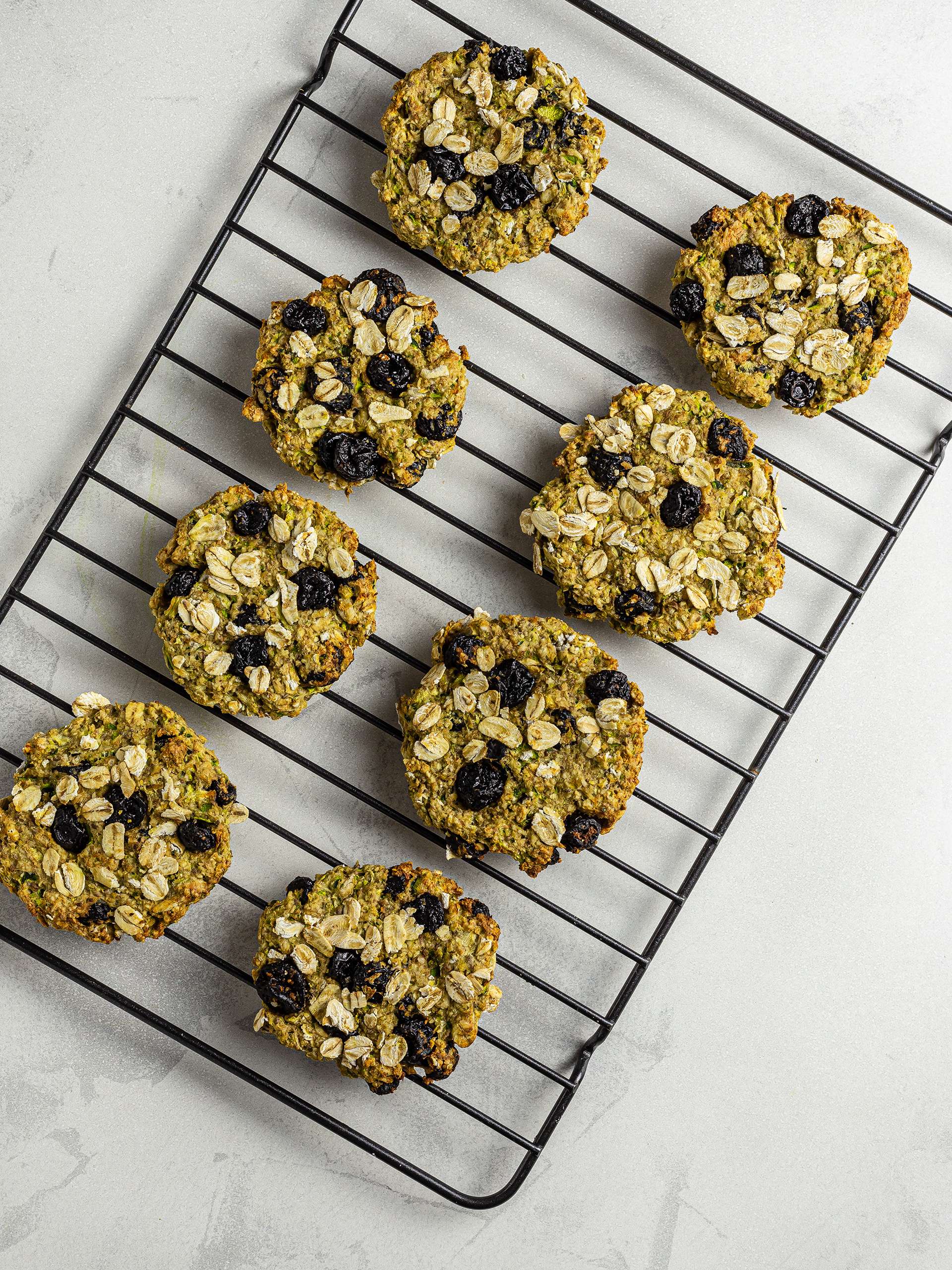 Baked zucchini cookies on a wire rack