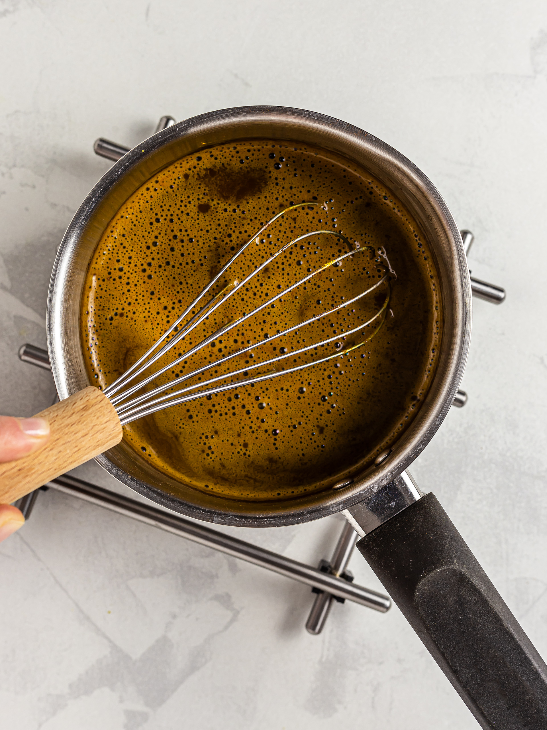 Whisked turmeric hot chocolate to make it foamy