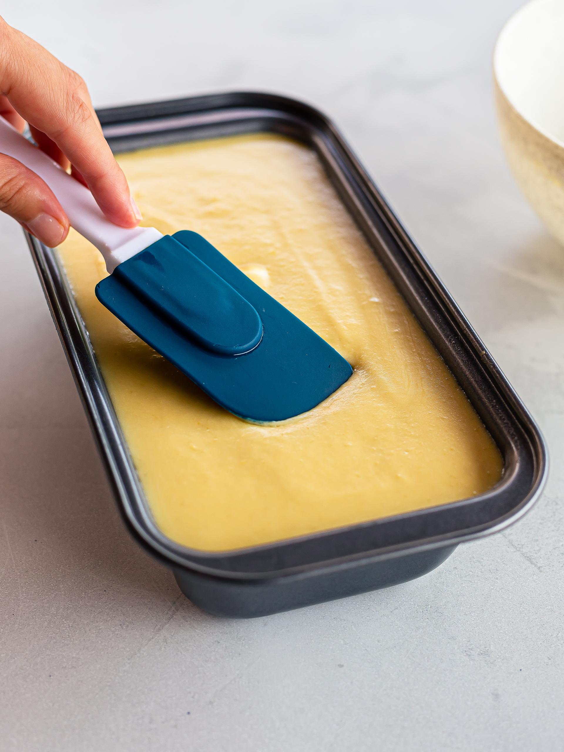 jackfruit ice cream base poured into a loaf tin for freezing