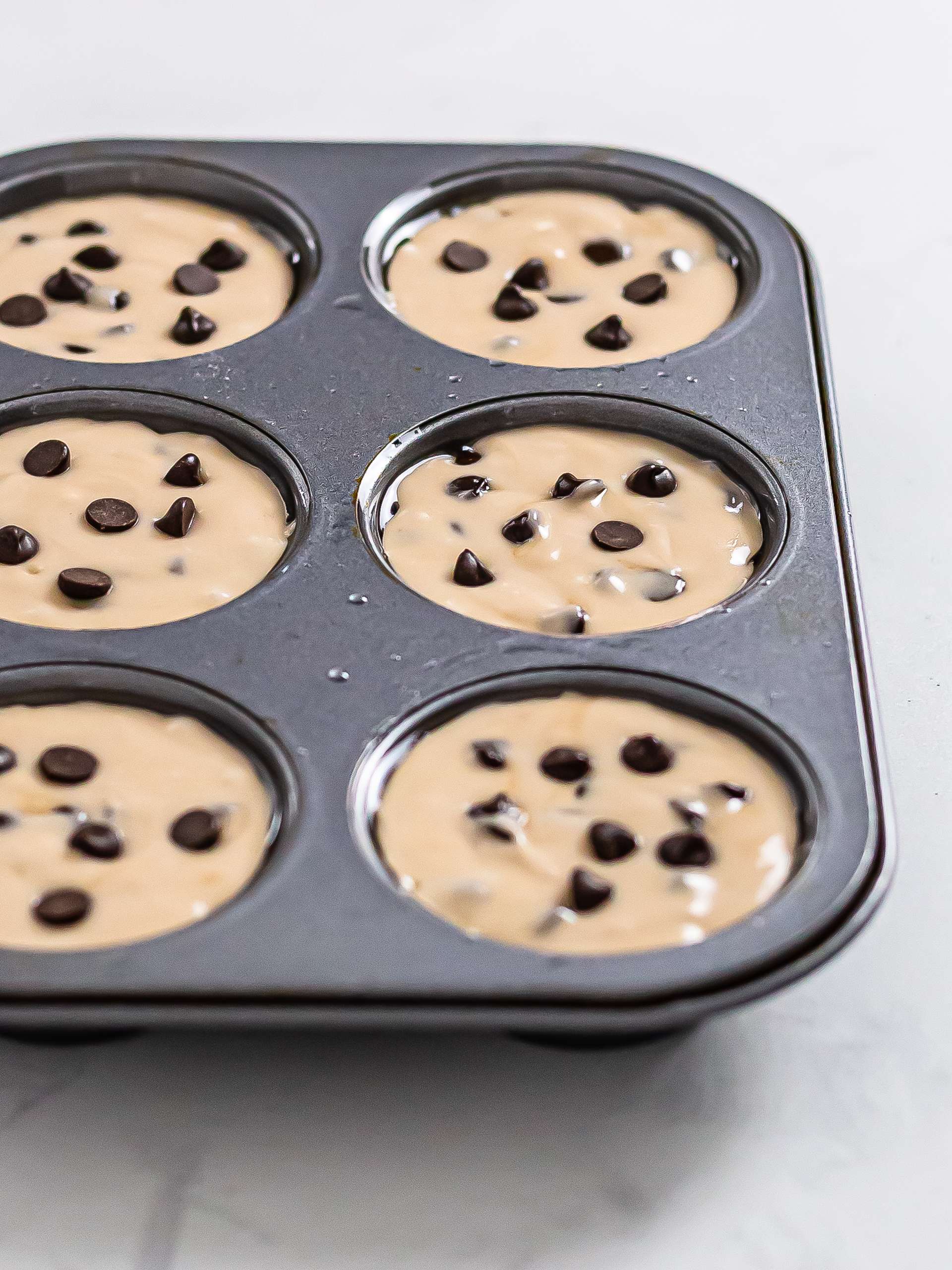 mochi muffins batter in a muffin tray