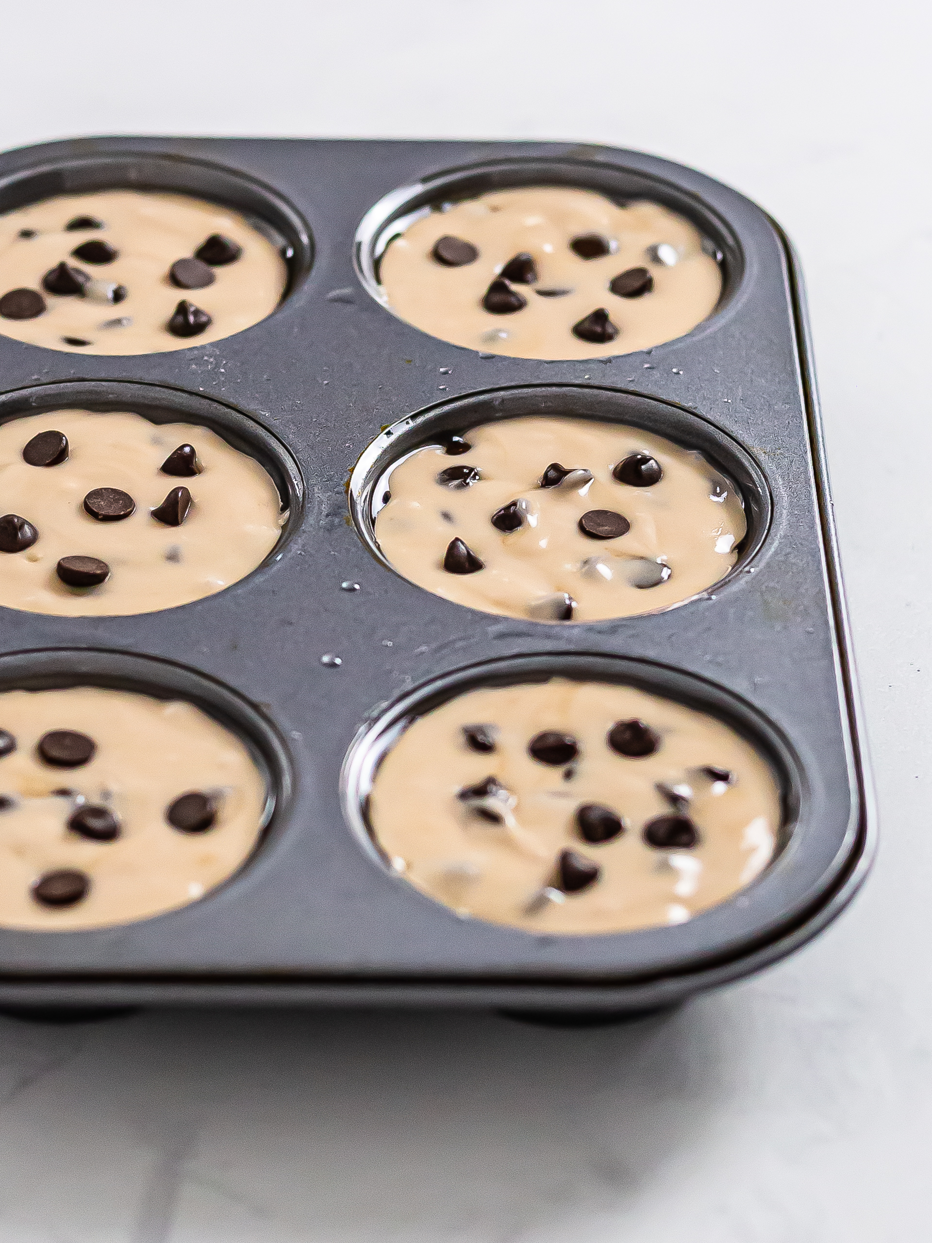 mochi muffins batter in a muffin tray
