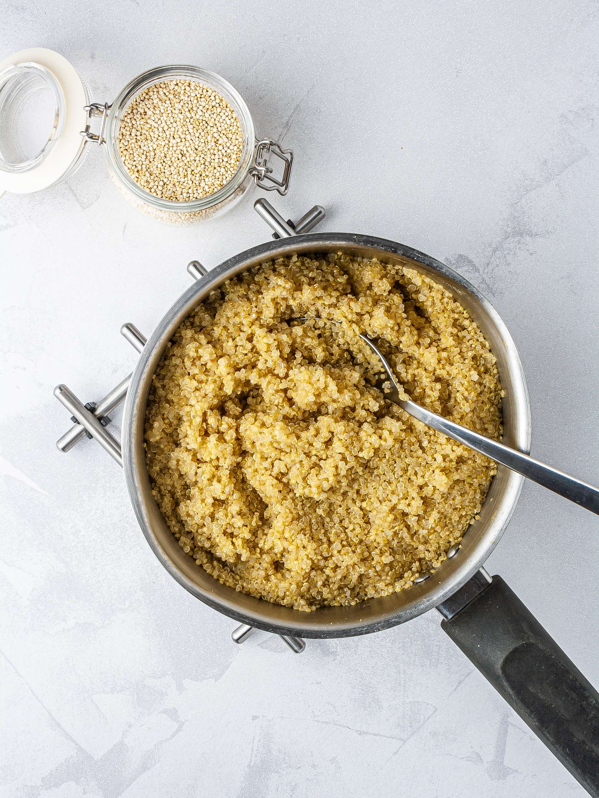 Cooked quinoa in a pan.