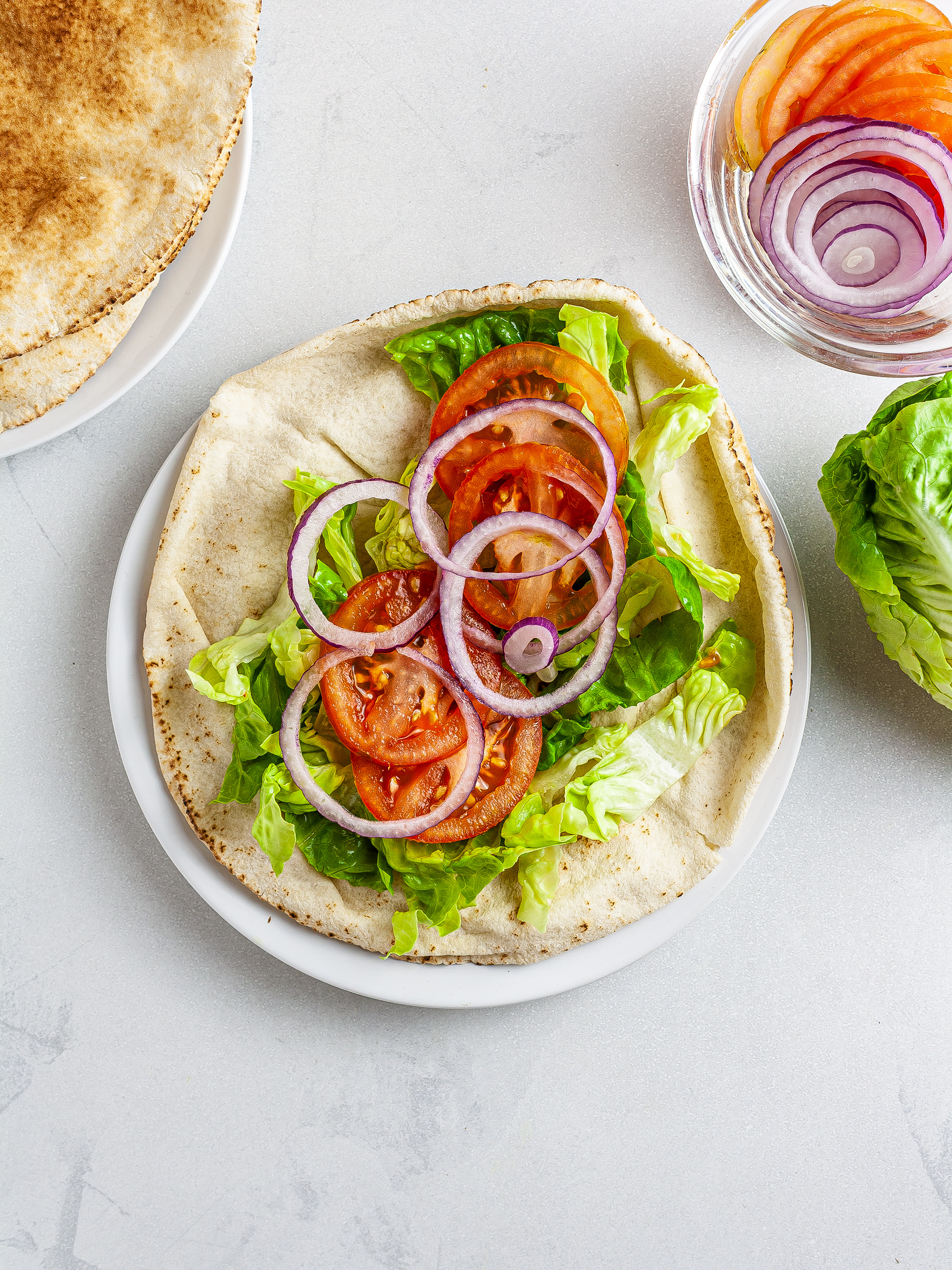 Kebab flatbread topped with salad