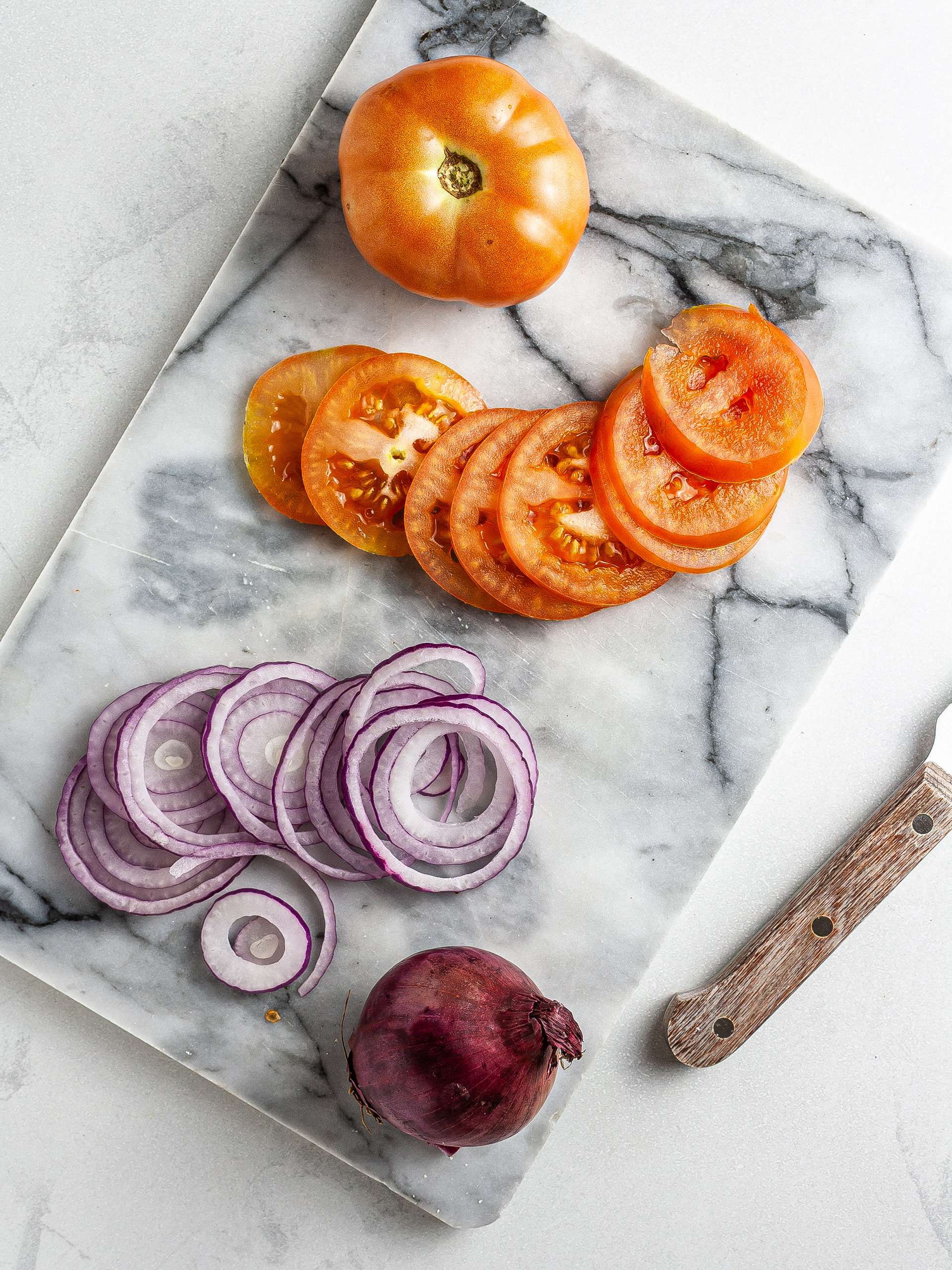 Sliced tomatoes and onions