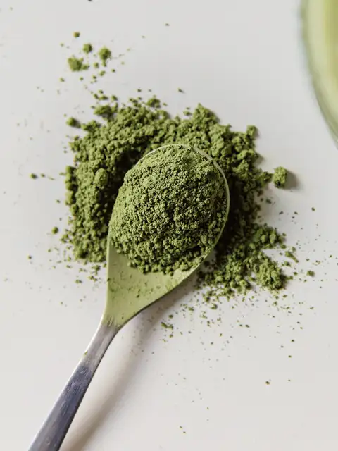 matcha powder on a spoon
